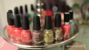Rotating tray filled with colorful nail polishes, featuring nail color ideas and nail color trends.