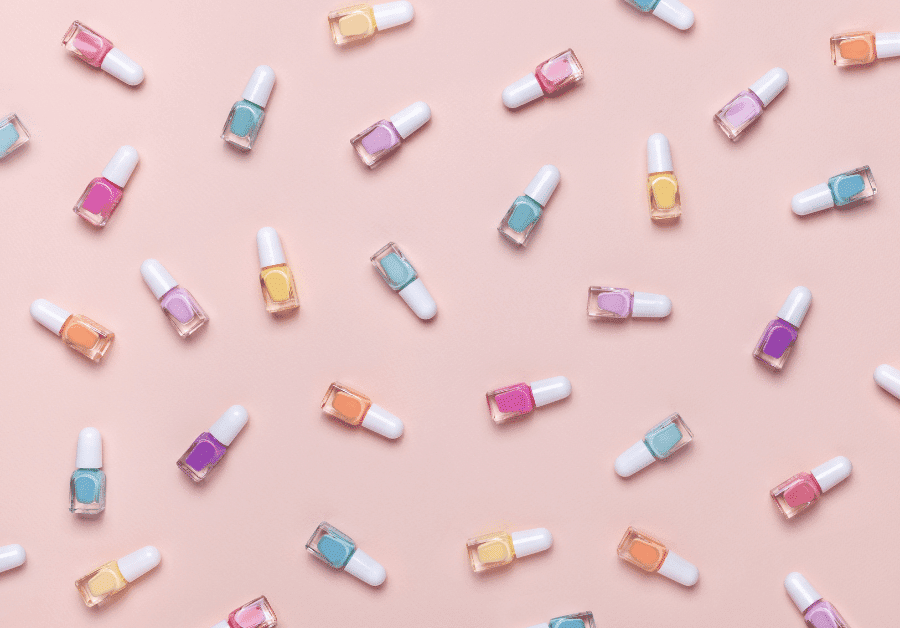 Assorted nail polishes in different colors, offering creative nail color ideas.