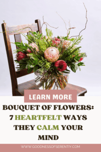 Glass vase filled with a bouquet of flowers in soft natural light.