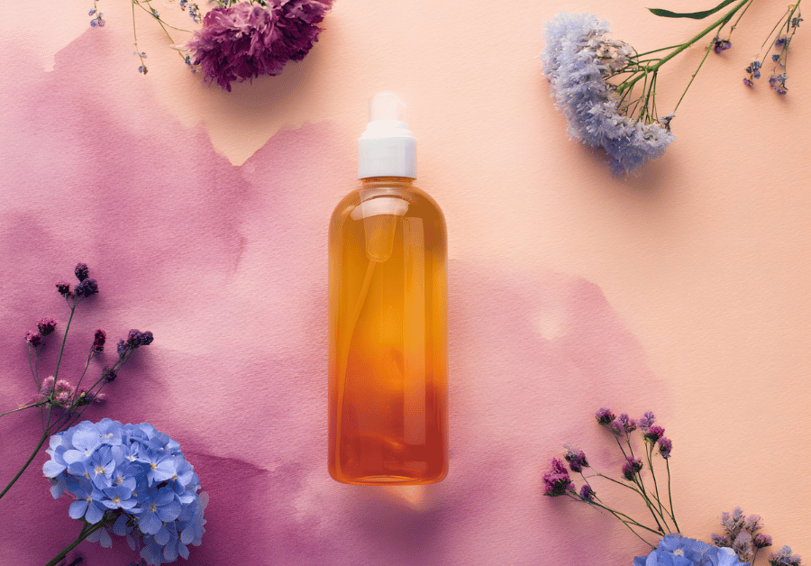 Body wash bottle surrounded by fresh flowers, highlighting fragrant and visually pleasing body wash combos for a luxurious self-care routine.