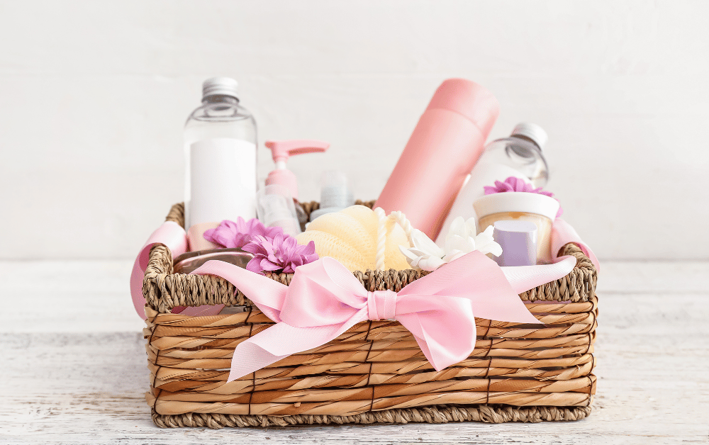 A cute self-care gift basket filled with pampering items like skincare products, water bottles and cozy treats, perfect for relaxation and mental wellness.