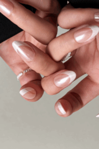 Almond shaped New Year’s nails with a chic and elegant design.