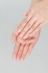 close-up of glitter New Year’s nails with elegant shimmer.