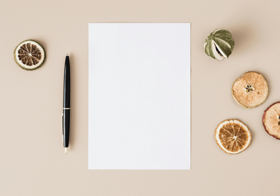 Self-care checklist on paper with a pen, daily, weekly, and monthly self-care ideas, self-care essentials, and printable template for women.