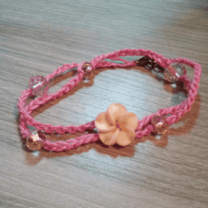 Colorful friendship bracelets displayed together, styled as fun and thoughtful Galentine’s party ideas.