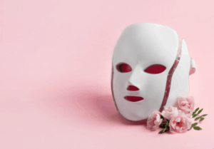A sleek LED beauty mask glowing softly, perfect among beauty devices and unique gift ideas.