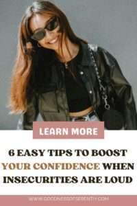 A woman smiling with confidence, showing how to stop comparing yourself to others when insecurities are loud.